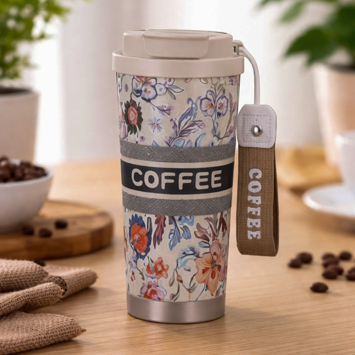 Beige floral insulated coffee travel tumbler with lid by Kaari Tales, designed for hot beverages on the go.