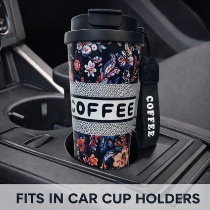 Black floral insulated coffee travel mug with lid by Kaari Tales, featuring a stylish floral pattern and secure spill-proof lid.
