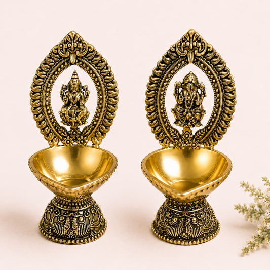 Brass diya lamp featuring Divine Ganesha and Lakshmi sitting on a lotus flower, crafted by KaariTales.